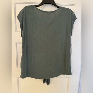 Olive green/gray-ish soft t-shirt. Comes from a smoke-free home!